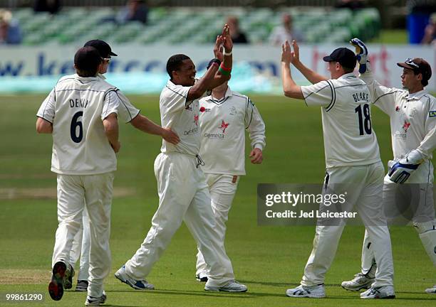 Makhaya Ntini of Kent celebrates with his team mates after taking the wicket of Scott Borthwick of Durham during the LV County Championship Division...