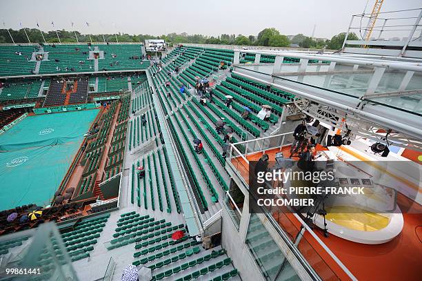 View of the TV set of French TV France Televisions set up in the tribune of the Philippe Chatrier stadium at Roland Garros, in Paris, on May 26 as...