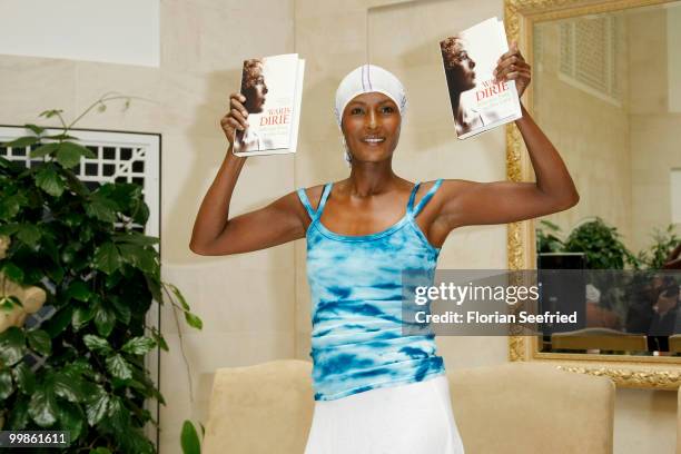 Model, writer Waris Dirie poses for the media during her book presentation of 'Schwarze Frau, Weisses Land' at Hotel Adlon on May 18, 2010 in Berlin,...