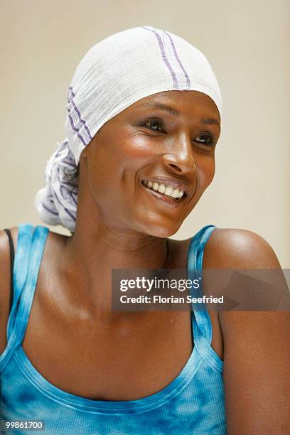 Model, writer Waris Dirie poses for the media during her book presentation of 'Schwarze Frau, Weisses Land' at Hotel Adlon on May 18, 2010 in Berlin,...