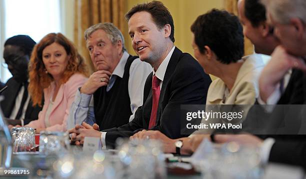 British Deputy Prime Minister, Nick Clegg , reacts during 'The Big Society' meeting in the cabinet room of 10 Downing Street on May 18, 2010 in...