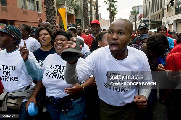 Striking rail workers march through the city center in Cape Town, on May 18, 2010. The strike left two million commuters stranded on the eve just 24...