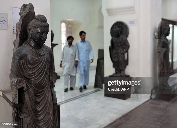 Pakistani students visit a museum in Peshawar on May 18 on International Museum Day. International Museum Day has been observed worldwide since 1977....