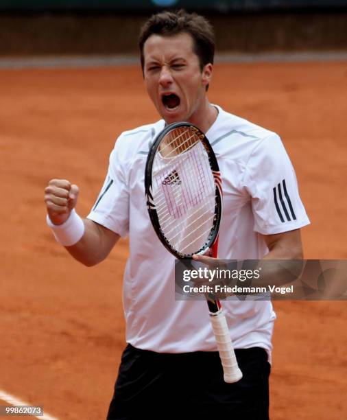 Philipp Kohlschreiber of Germany celebrates after winning his match against Horacio Zeballos of Argentina during day three of the ARAG World Team Cup...