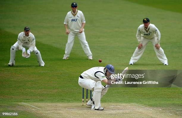 James Adams of Hampshire avoids a bouncer from Darren Patinson of Nottinghamshire during the LV County Championship match between Nottinghamshire and...