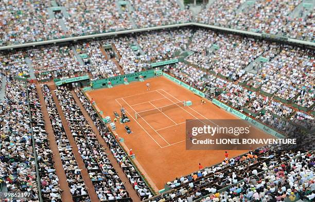 Spanish player Rafael Nadal returns a ball to Swedish player Robin Soderling during a French Open tennis round of 16 match on May 31, 2009 at Roland...