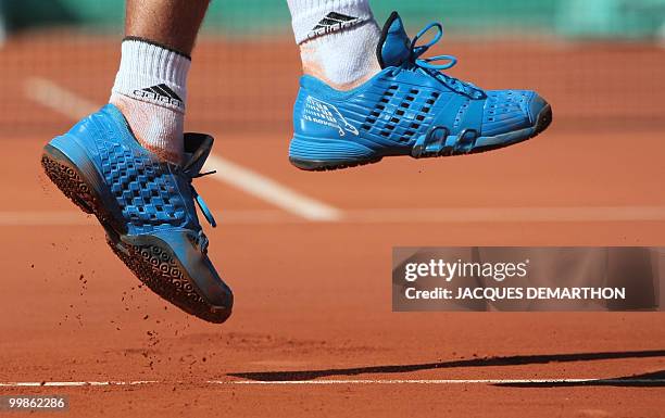 Serbian player Novak Djokovic serves a ball to German player Philipp Kohlschreiber in a French Open tennis third round match on May 30, 2009 at...