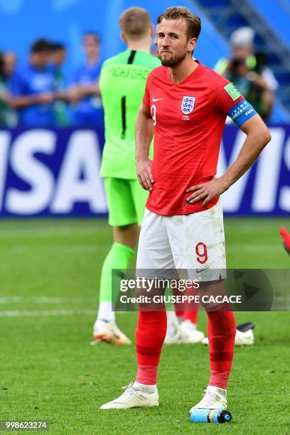 England's forward Harry Kane reacts to Belgium's victory at the end of their Russia 2018 World Cup play-off for third place football match between...