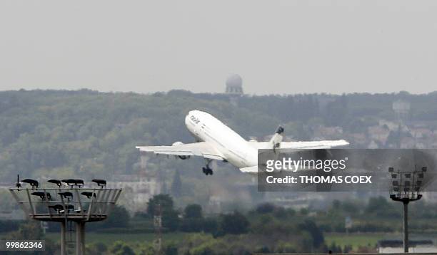 Picture taken on May 18, 2010 shows an Iran Air plane takes off which alledgedly is to carry home Iranian agent Ali Vakili Rad, on May 18, 2010 at...