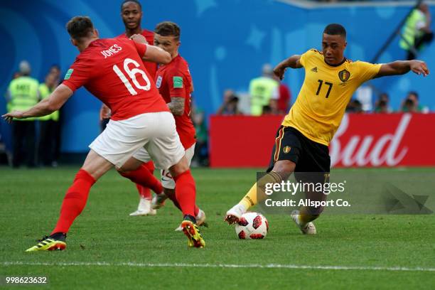 Youri Tielemans of Belgium battles for the ball with Phil Jones of England during the 2018 FIFA World Cup Russia 3rd Place Playoff match between...