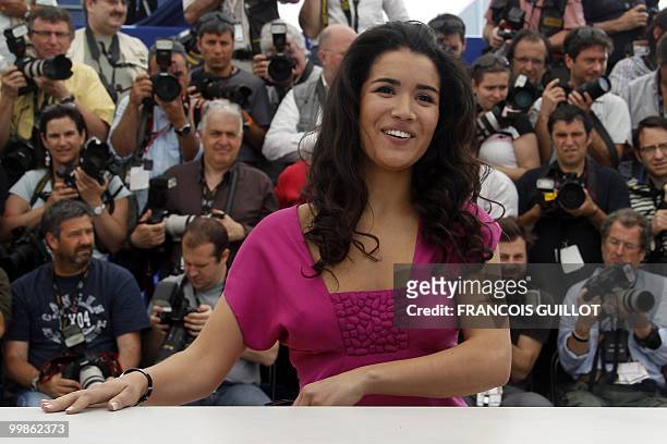 French actress Sabrina Ouazani poses during the photocall of "Des Hommes et des Dieux" presented in competition at the 63rd Cannes Film Festival on...