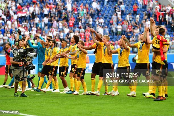 Belgium's players celebrate their victory with fans after their Russia 2018 World Cup play-off for third place football match between Belgium and...
