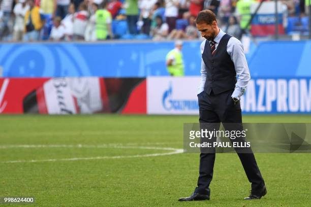 England's coach Gareth Southgate reacts after his team lost the Russia 2018 World Cup play-off for third place football match between Belgium and...