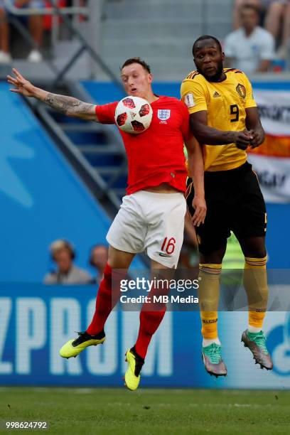 Romelu Lukaku of Belgium and Phil Jones of England vie for the ball during the 2018 FIFA World Cup Russia 3rd Place Playoff match between Belgium and...