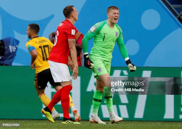 Jordan Pickford and Phil Jones of England react after Eden Hazard of Belgium scored a goal during the 2018 FIFA World Cup Russia 3rd Place Playoff...