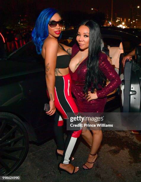 Zonnique Pullins and Tameka 'Tiny' Harris attend her Birthday celebration at Gold Room on July 14, 2018 in Atlanta, Georgia.