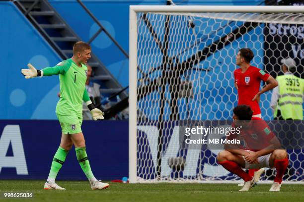 Jordan Pickford of England talks to Harry Maguire after allowing a goal during the 2018 FIFA World Cup Russia 3rd Place Playoff match between Belgium...