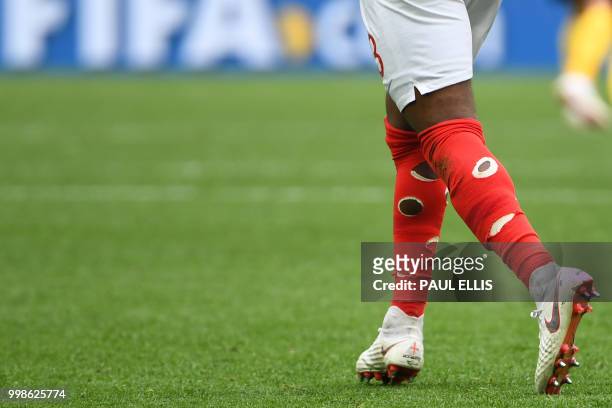 The socks of England's defender Danny Rose are seen during their Russia 2018 World Cup play-off for third place football match between Belgium and...