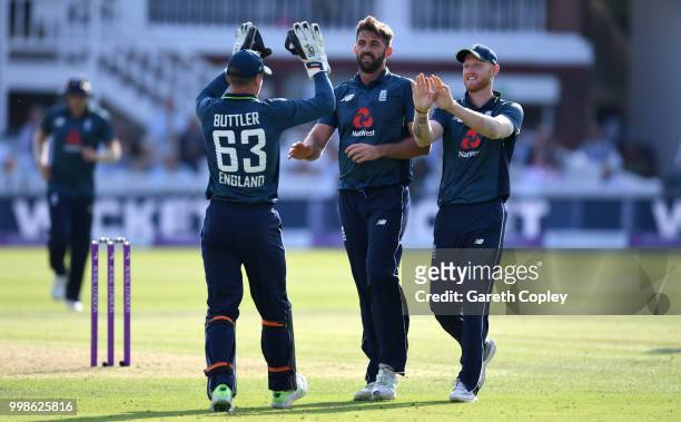 Liam Plunkett of England celebrates with Ben Stokes and Jos Buttler after dismissing Hardik Pandya of India during the 2nd ODI Royal London One-Day...