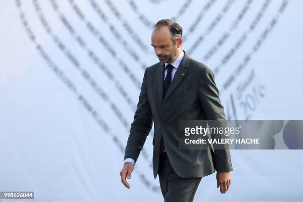 French Prime minister Edouard Philippe leaves after his speech in Nice on July 14, 2018 during a ceremony marking the second anniversary of the...