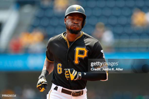 Starling Marte of the Pittsburgh Pirates rounds second after hitting a home run in the first inning during game one of a doubleheader against the...