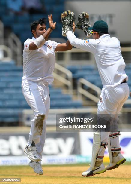 Abu Jayed of Bangladesh celebrates the dismissal of Shimron Hetmyer of West Indies during day 3 of the 2nd Test between West Indies and Bangladesh at...
