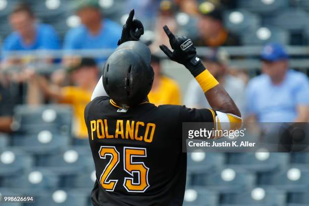 Gregory Polanco of the Pittsburgh Pirates reacts after hitting a home run in the first inning during game one of a doubleheader against the Milwaukee...