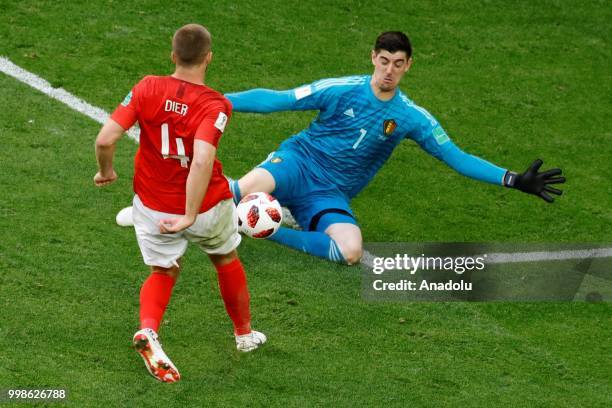 Eric Dier of England in action against Thibaut Courtois of Belgium during the 2018 FIFA World Cup Russia Play-Off for Third Place between Belgium and...