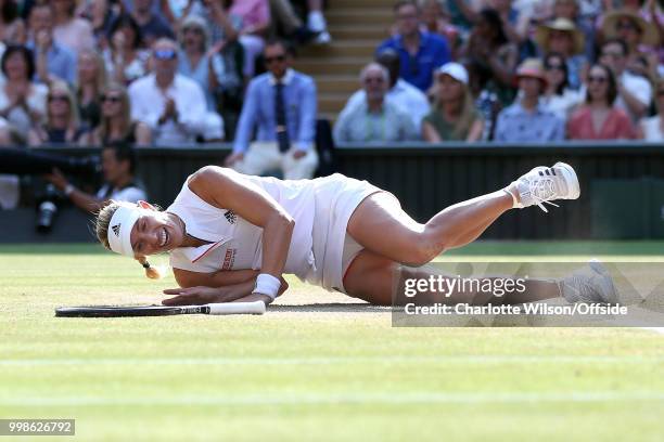 Womens Singles Final - Serena Williams v Angelique Kerber - Angelique Kerber collapses to the ground as she celebrates winning at All England Lawn...