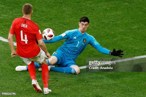 Eric Dier of England in action against Thibaut Courtois of Belgium during the 2018 FIFA World Cup Russia Play-Off for Third Place between Belgium and...