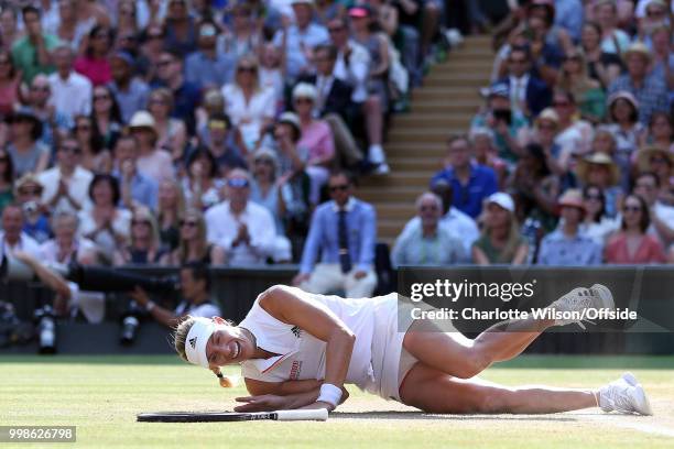 Womens Singles Final - Serena Williams v Angelique Kerber - Angelique Kerber collapses to the ground as she celebrates winning at All England Lawn...