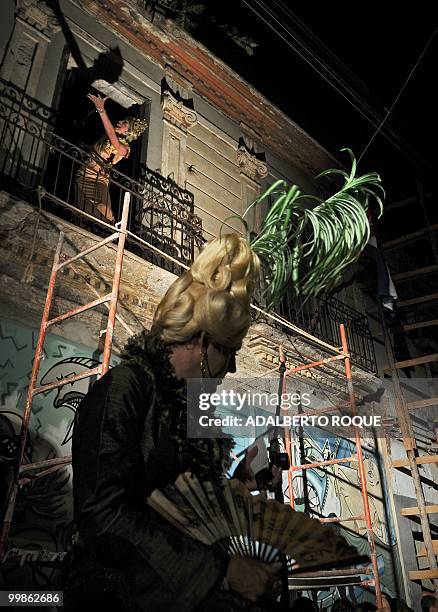 Cuban transvestites perform during a transvestite show, on May 17 in a street of Santa Clara city - 300 km from Havana. This transvestite show, the...