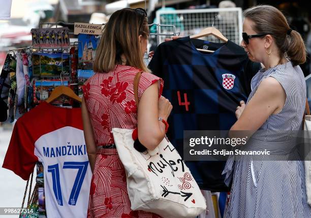 Woman's look at the Croatia's national football team jerseys on July 14, 2018 in Zagreb, Croatia. This is the first time Croatia has reached the...