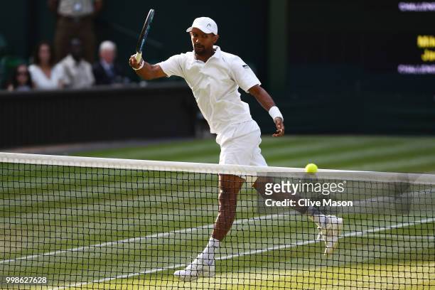 Raven Klaasen of South Africa returns against Mike Bryan and Jack Sock of The United States during the Men's Doubles final on day twelve of the...