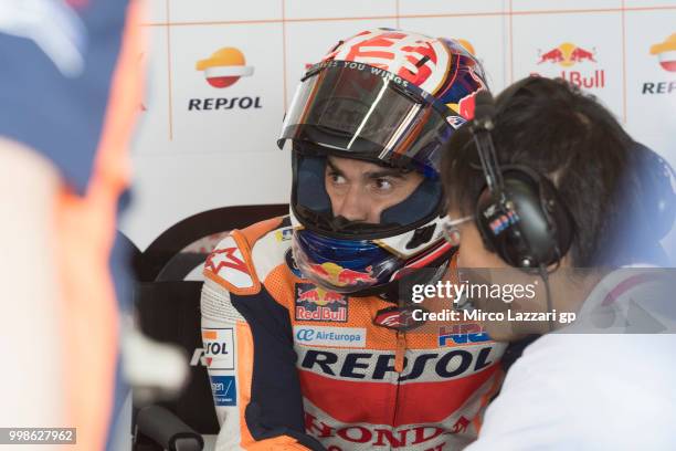 Dani Pedrosa of Spain and Repsol Honda Team speaks in box during the qualifying practice during the MotoGp of Germany - Qualifying at Sachsenring...