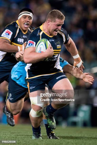 Brumbies player Nick Mayhew breaks a tackle at week 19 of the Super Rugby between The Waratahs and Brumbies at Allianz Stadium in Sydney on July 14,...