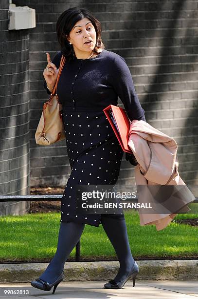 British Conservative Party Co-Chairman and Minister Without Portfolio, Baroness Sayeeda Warsi, arrives to attend the weekly cabinet meeting at 10...