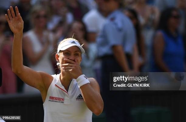 Germany's Angelique Kerber reacts after winning against US player Serena Williams during their women's singles final match on the twelfth day of the...