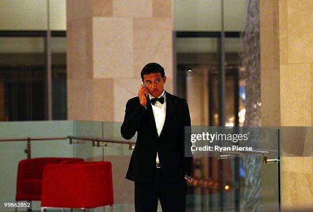 Tim Cahill of Australia and Everton speaks on his phone before hosting a gala dinner in aid of the Tim Cahill Cancer Fund for Children at the Hilton...