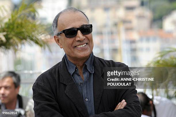 Iranian director Abbas Kiarostami poses during the photocall of "Copie Conforme presented in competition at the 63rd Cannes Film Festival on May 18,...