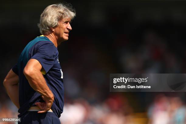 West Ham manager Manuel Pellegrini looks on during the pre-season friendly match between Wycombe Wanderers and West Ham United at Adams Park on July...