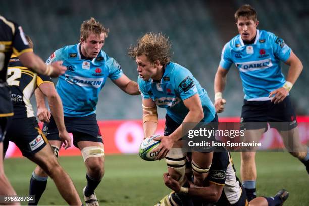 Waratahs player Ned Hanigan looks to get the pass away at week 19 of the Super Rugby between The Waratahs and Brumbies at Allianz Stadium in Sydney...