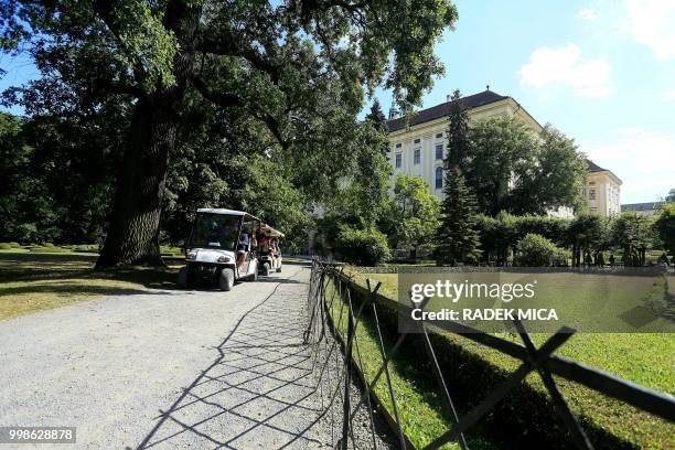 People visit the garden of the Kromeriz castle in the Czech city of Kromeriz on July 13, 2018. - Churches in the Czech Republic are up in arms...