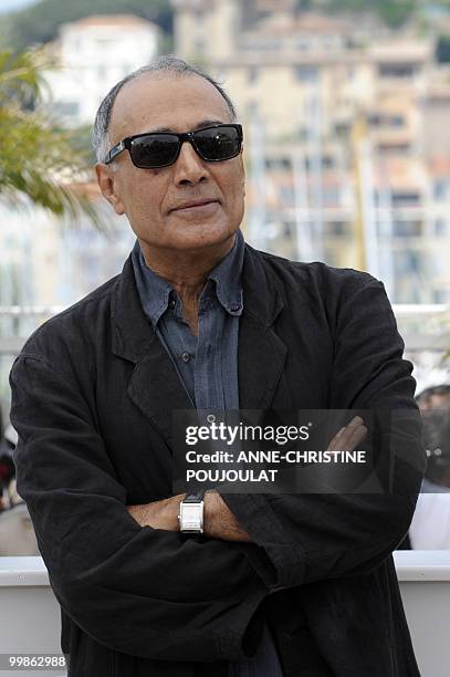 Iranian director Abbas Kiarostami poses during the photocall of "Copie Conforme presented in competition at the 63rd Cannes Film Festival on May 18,...