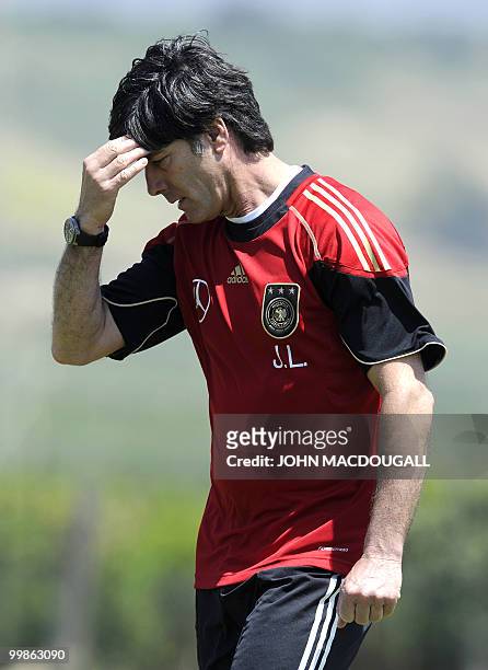 Germany's head coach Joachim Loew takes part in a training session at the Verdura Golf and Spa resort, near Sciacca May 18, 2010. The German team is...