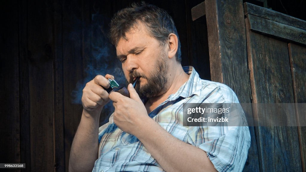Man smoking a pipe