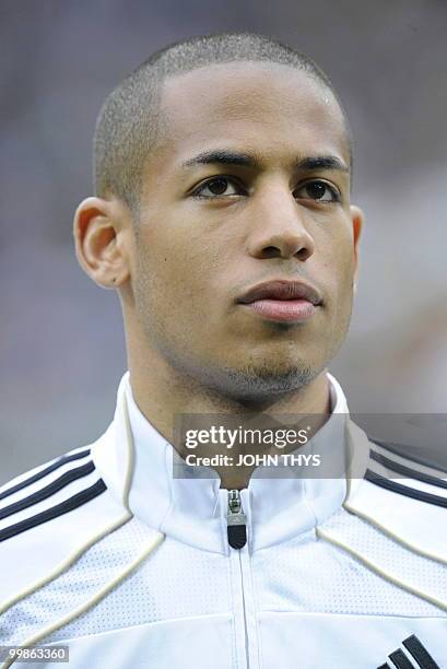 Germany's defender Dennis Aogo listens to the national anthems ahead of the friendly football match Germany vs Malta in the western German city of...