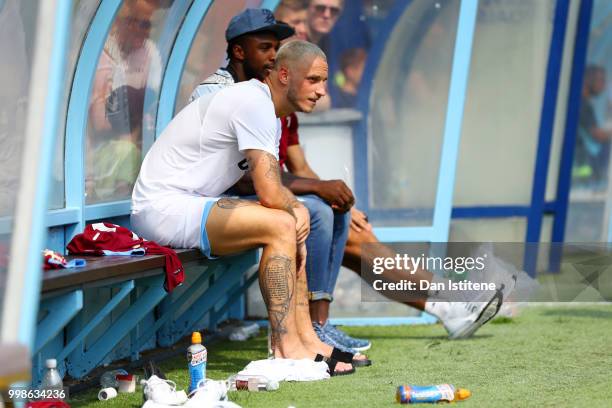 Marko Arnautovic looks on from the bench during the pre-season friendly match between Wycombe Wanderers and West Ham United at Adams Park on July 14,...