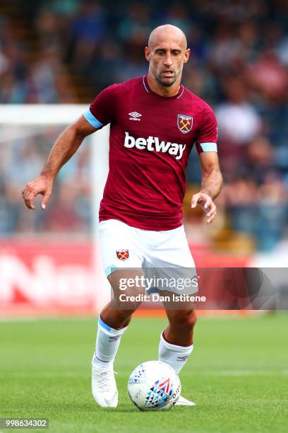 Pablo Zabaleta of West Ham runs with the ball during the pre-season friendly match between Wycombe Wanderers and West Ham United at Adams Park on...