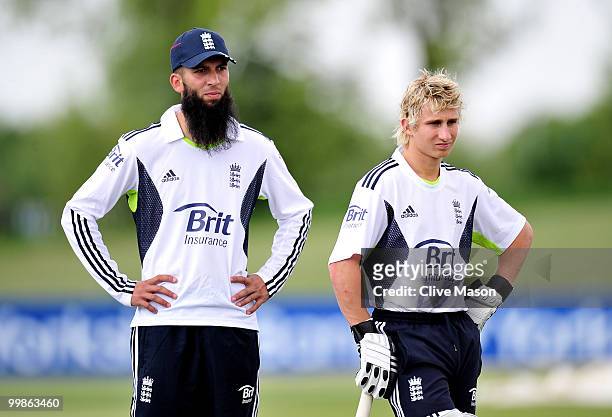 Moeen Ali and James Taylor of England Lions take a break during a net session at The County Ground on May 18, 2010 in Derby, England.